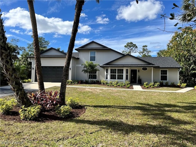 single story home featuring a garage and a front yard