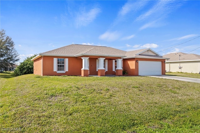 view of front facade featuring a garage and a front lawn