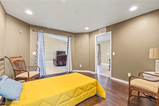 bedroom featuring hardwood / wood-style floors