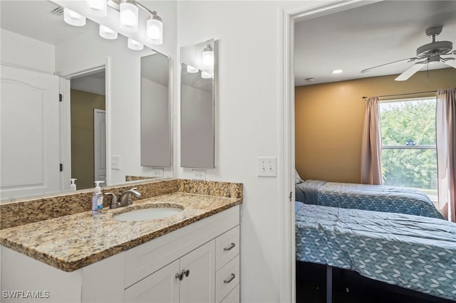 bathroom featuring vanity and ceiling fan