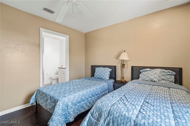 bedroom with hardwood / wood-style flooring, ceiling fan, and connected bathroom