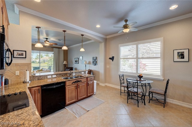 kitchen featuring a ceiling fan, ornamental molding, a peninsula, black appliances, and a sink