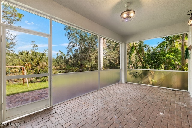 view of unfurnished sunroom