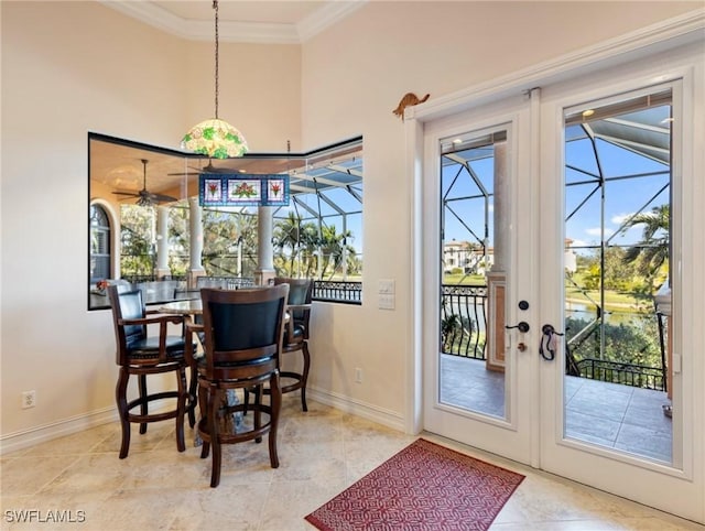 doorway featuring ornamental molding and light tile patterned flooring