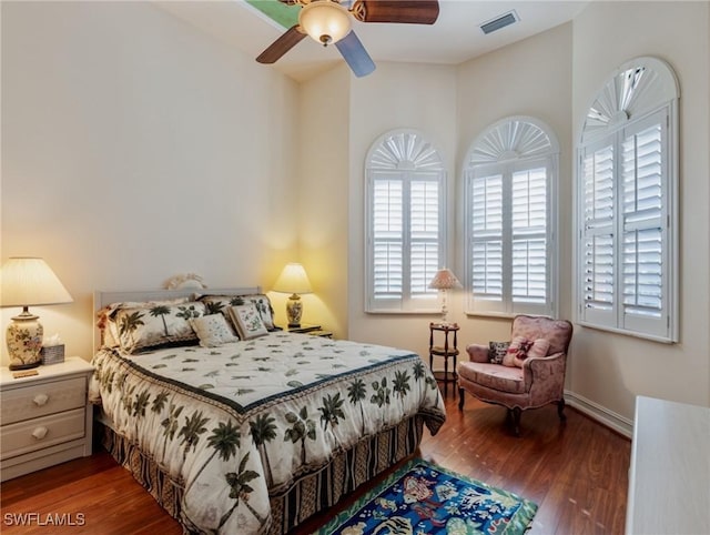 bedroom featuring hardwood / wood-style floors and ceiling fan