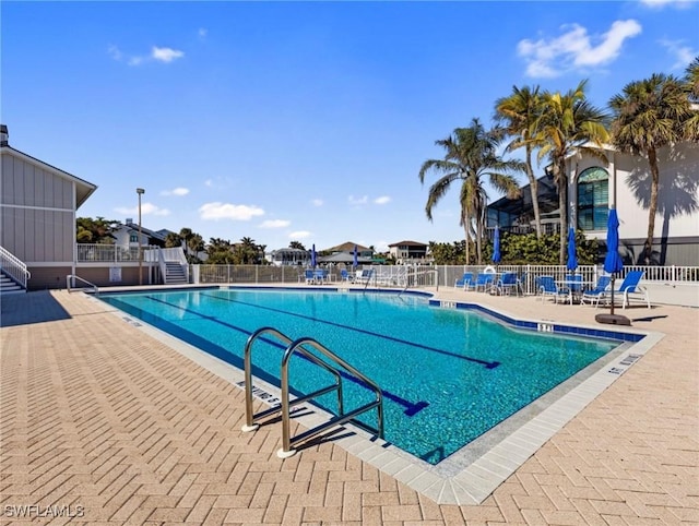 view of pool featuring a patio area