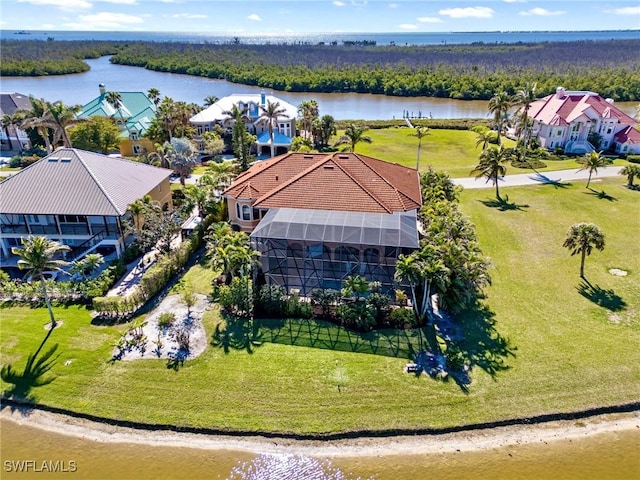 birds eye view of property featuring a water view