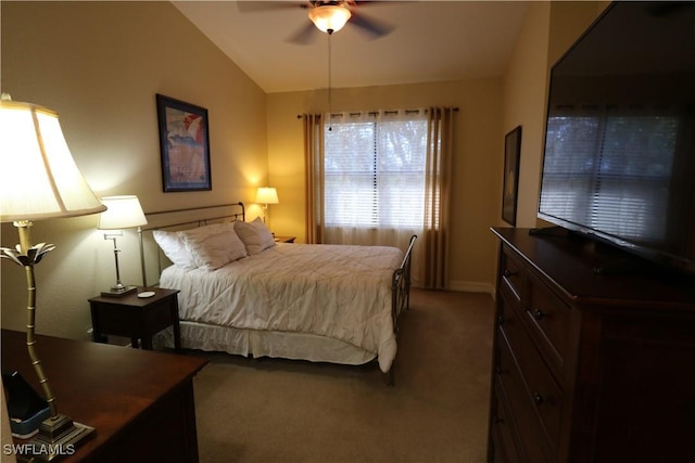 carpeted bedroom with lofted ceiling and ceiling fan