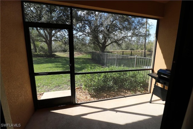 view of unfurnished sunroom