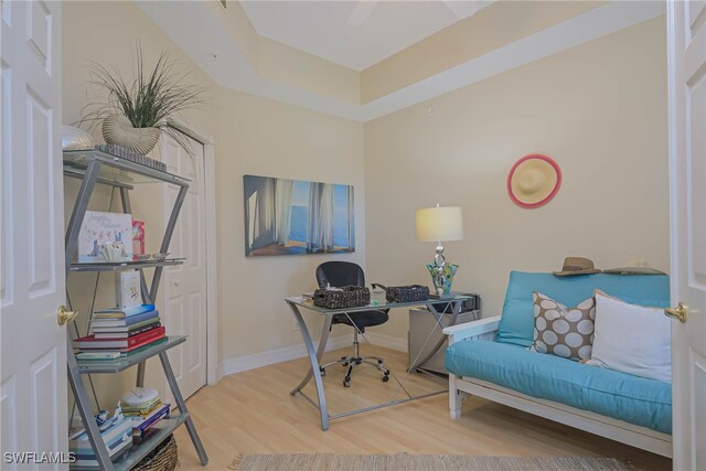 office area with wood-type flooring