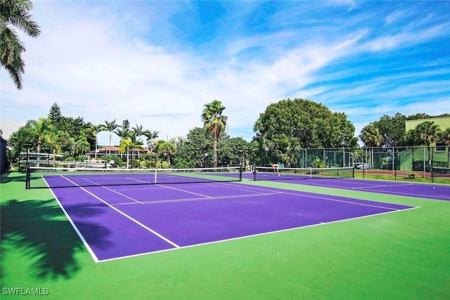 view of sport court with basketball hoop