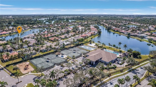 birds eye view of property featuring a residential view and a water view