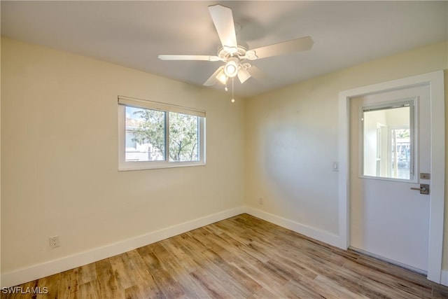 unfurnished room with ceiling fan and light hardwood / wood-style floors