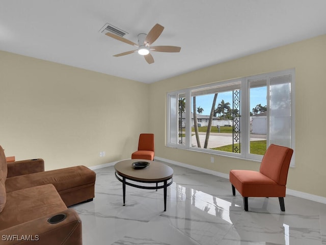 living room with ceiling fan