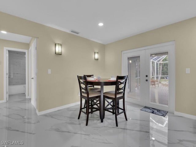 dining room featuring french doors