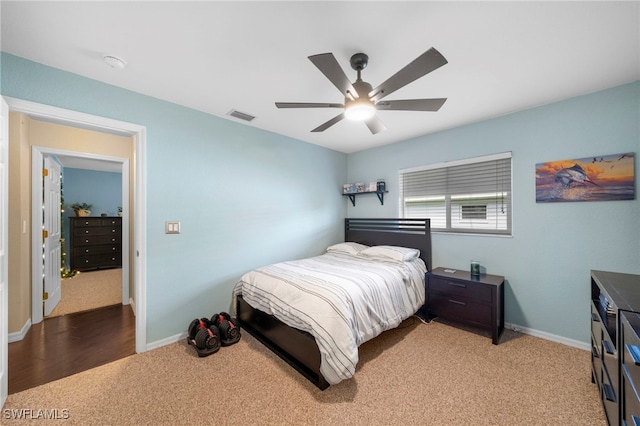 carpeted bedroom featuring ceiling fan