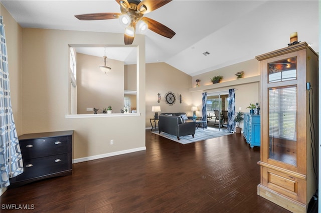 living room featuring dark wood-type flooring, ceiling fan, lofted ceiling, and built in shelves