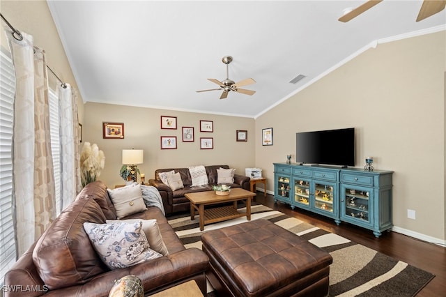 living room featuring ceiling fan, ornamental molding, dark hardwood / wood-style flooring, and vaulted ceiling