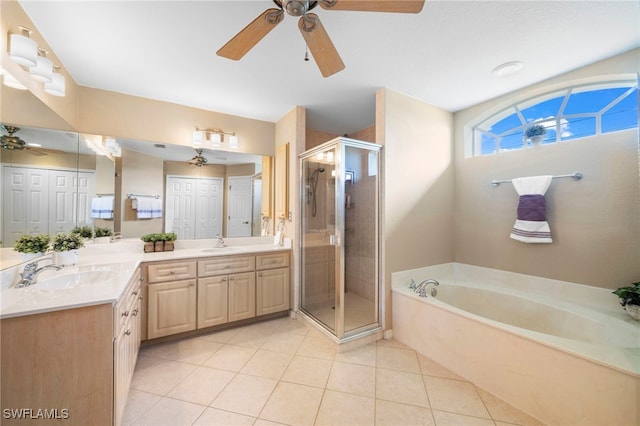 bathroom with vanity, tile patterned flooring, independent shower and bath, and ceiling fan