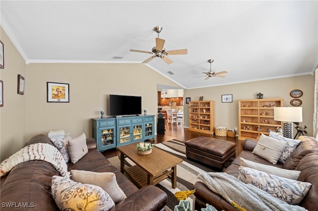 living room with ceiling fan, lofted ceiling, ornamental molding, and dark hardwood / wood-style floors