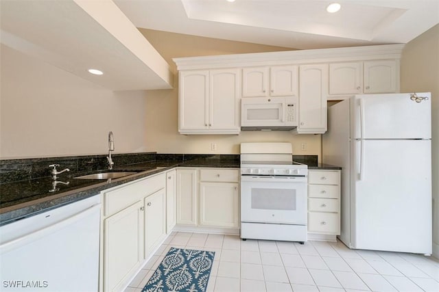 3219 Horse Carriage Way Unit 306, Naples, FL 34105 - kitchen with recessed lighting, a sink, dark stone countertops, and white appliances