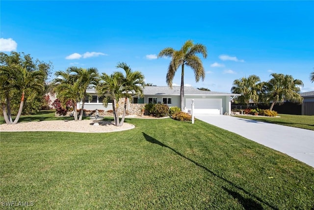 ranch-style house with a garage and a front yard