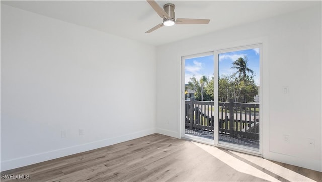 unfurnished room featuring ceiling fan and light hardwood / wood-style floors