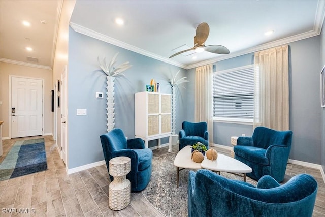 living area with ornamental molding, light hardwood / wood-style floors, and ceiling fan