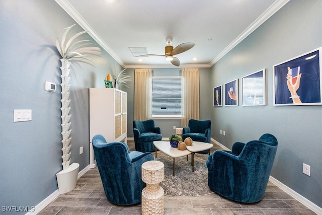 sitting room with crown molding and ceiling fan