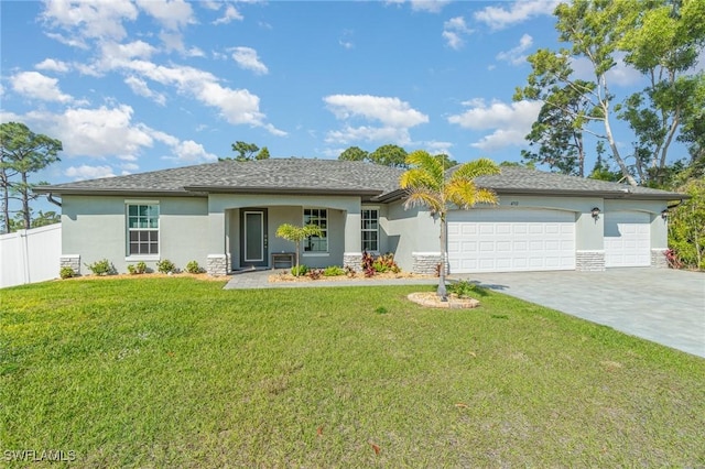 single story home featuring a garage, fence, a front lawn, and stucco siding