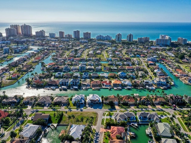 bird's eye view with a water view