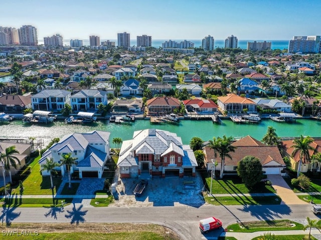 bird's eye view with a water view