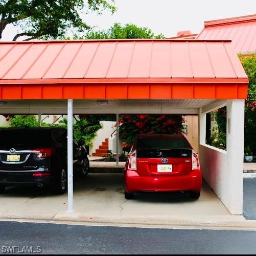 view of parking featuring a carport