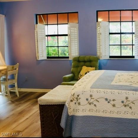 bedroom featuring hardwood / wood-style floors