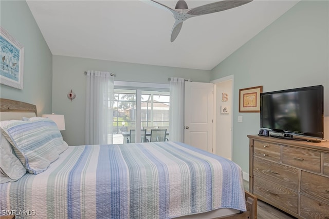 bedroom featuring lofted ceiling, wood-type flooring, and ceiling fan