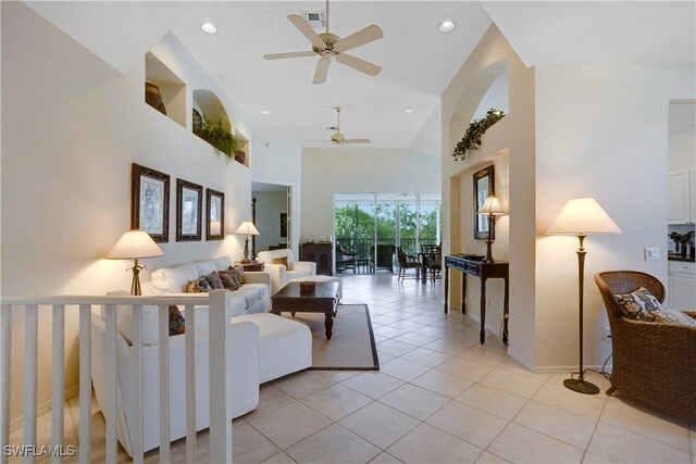 26980 Montego Pointe Ct Unit 202, Bonita Springs, FL 34134 - living room with high vaulted ceiling, a ceiling fan, light tile patterned floors, recessed lighting, and baseboards