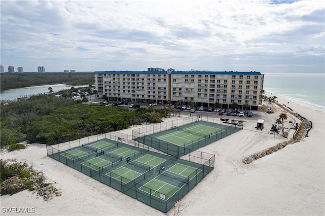 bird's eye view featuring a beach view and a water view