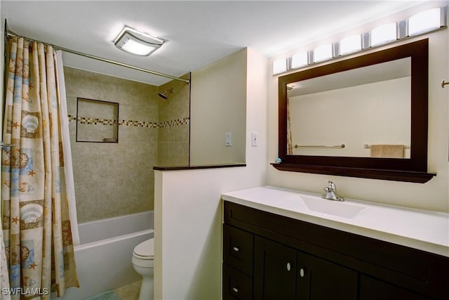 full bathroom with shower / bath combination with curtain, vanity, and toilet