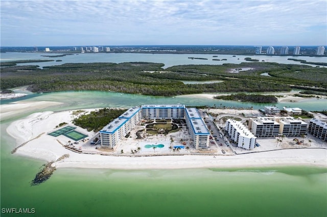 bird's eye view featuring a view of the beach and a water view