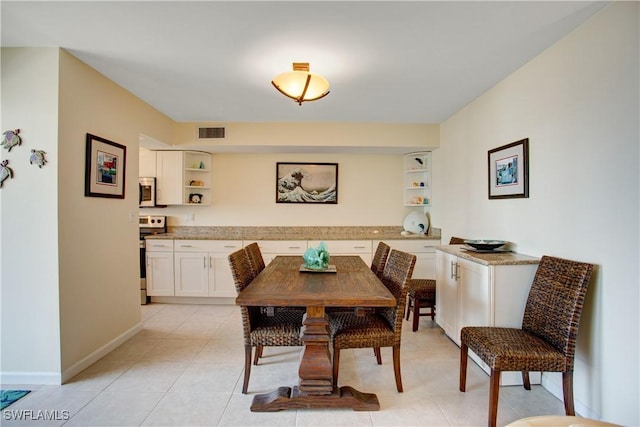 view of tiled dining area