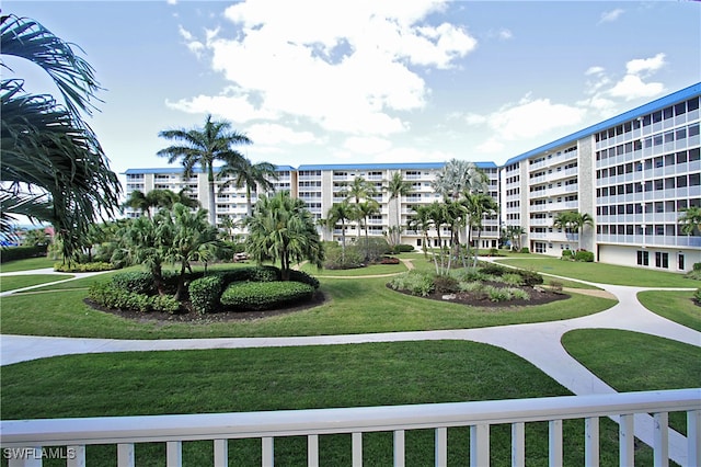 view of community featuring a yard