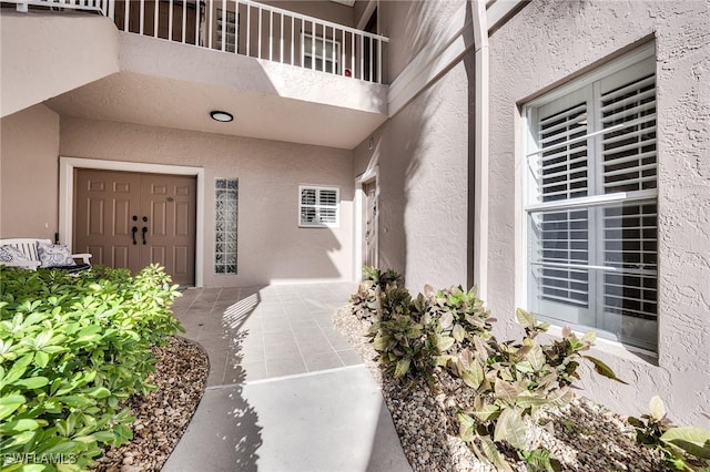 doorway to property with a balcony