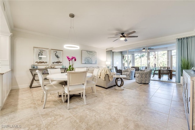 dining room featuring ornamental molding and ceiling fan