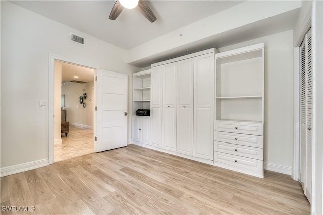 unfurnished bedroom featuring ceiling fan and light hardwood / wood-style flooring