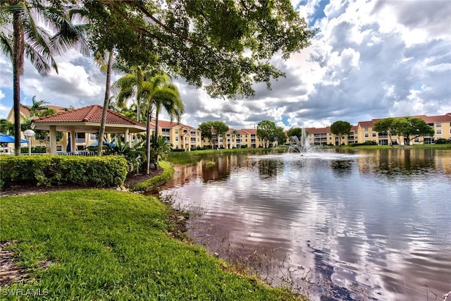 property view of water with a gazebo