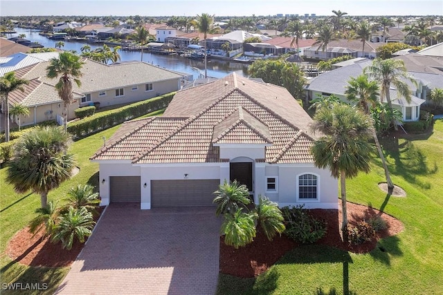 drone / aerial view with a water view