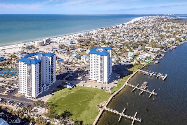 aerial view with a beach view and a water view