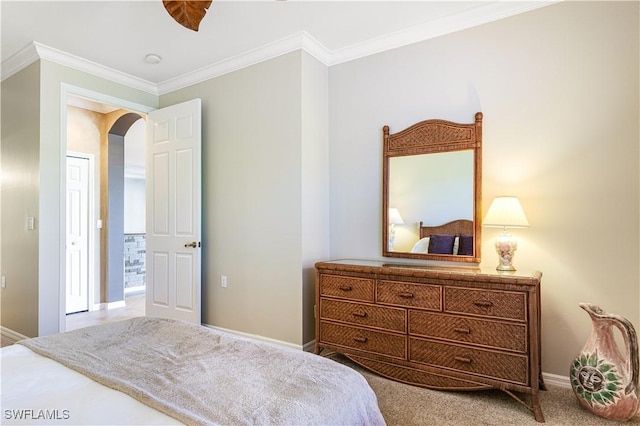 carpeted bedroom with crown molding