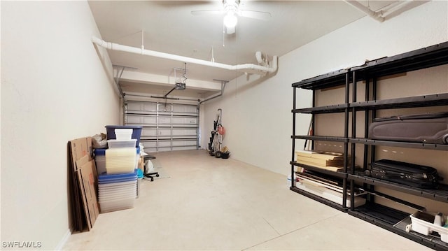 garage with a ceiling fan and a garage door opener