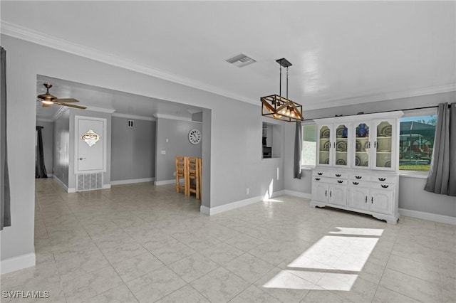 unfurnished room featuring crown molding and ceiling fan